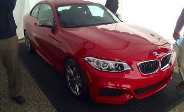 The BMW M235i has been spotted undisguised at a recent dealer presentation