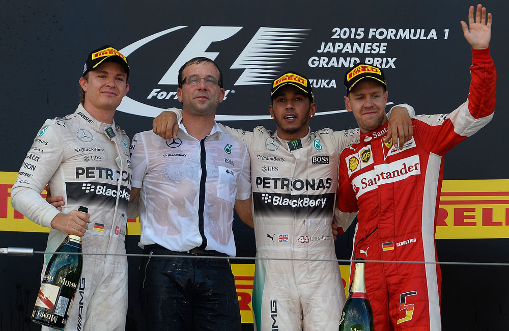 Lewis Hamilton (third from left) beat Mercedes-AMG F1 team-mate Nico Rosberg (left) into the first corner and romped to victory at Suzuka. Sebastian Vettel (right) salvaged third for Ferrari.