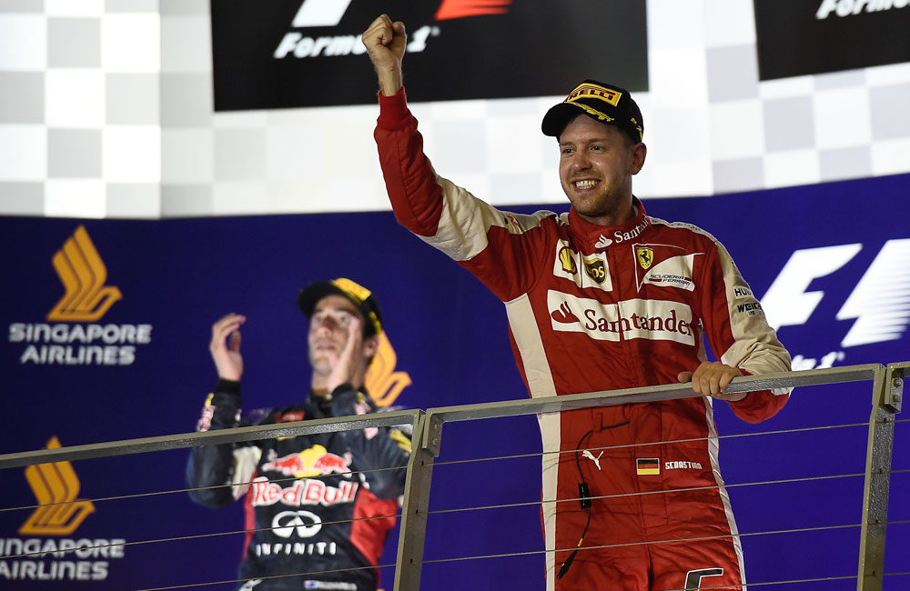 Ferrari's Sebastian Vettel (right) was so dominant in Singapore that second-placed Red Bull's Daniel Ricciardo was never really in contention for the win.