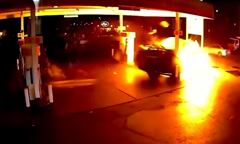 Uber driver slams into petrol station... and survives